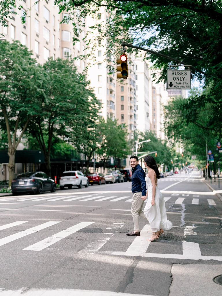 Romantic engagement portrait at Bethesda Terrace arcade with natural light