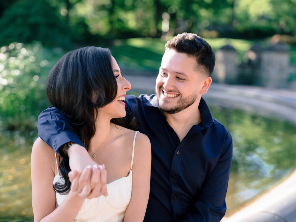 NYC engagement session at Bethesda Terrace with ornamental stone balustrades