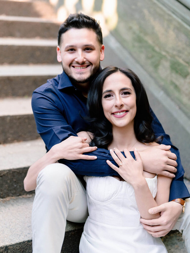 Bethesda Terrace engagement session capturing grand staircase and ornate balustrade