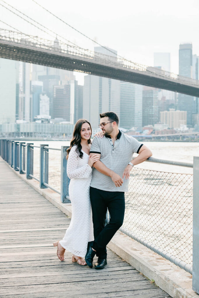 brooklyn engagement photos dumbo bridge views romantic kiss 26