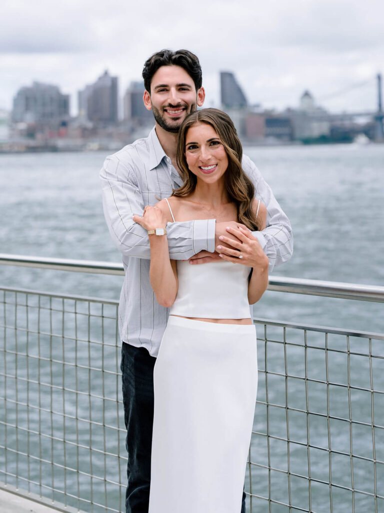 Brooklyn engagement party pre-session portraits at Domino Park waterfront location