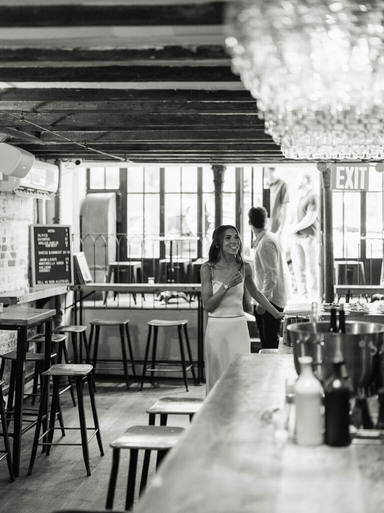 Bride-to-be candid moment at Sauced Brooklyn engagement party celebration