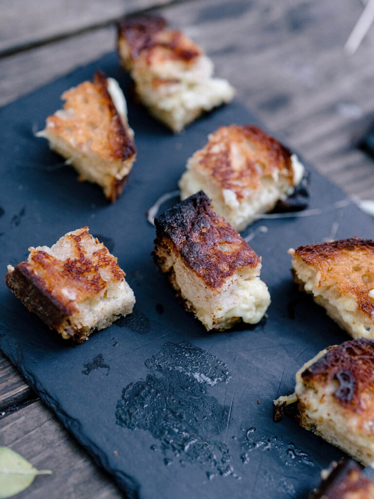 Brooklyn engagement party guests celebrating at outdoor garden venue in NYC