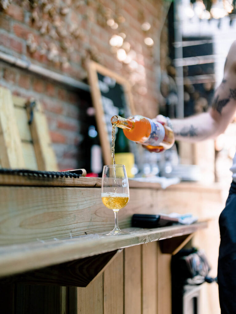 Candid engagement party moments captured at Sauced Brooklyn celebration venue