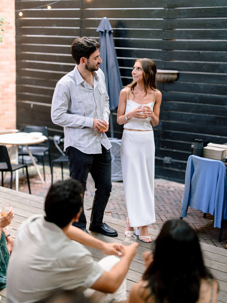 Joyful group moment during Brooklyn NYC engagement party celebration photos