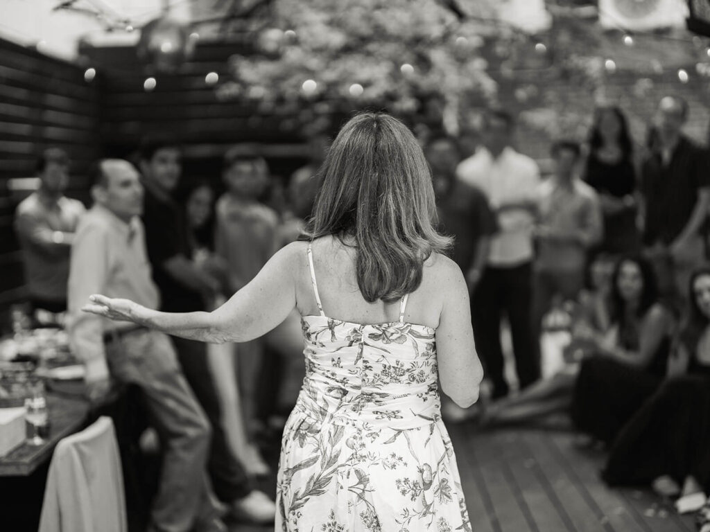 Outdoor Brooklyn engagement party at garden venue with summer celebration vibes