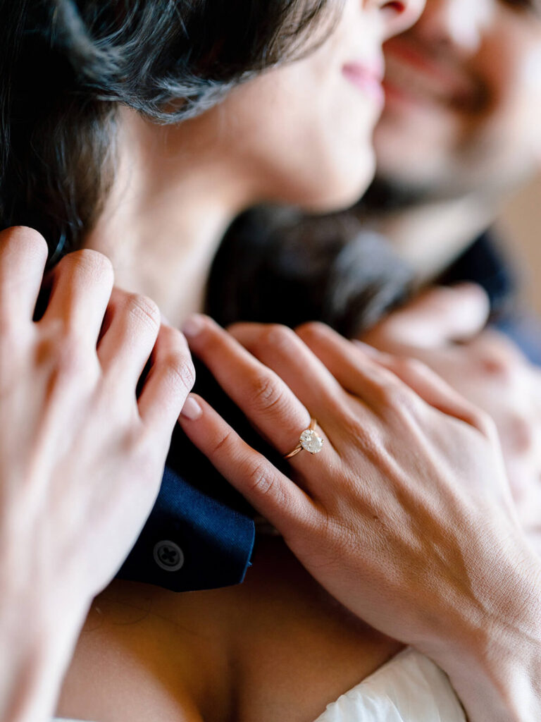 Intimate bar engagement photography at The Penrose NYC leather booth setting