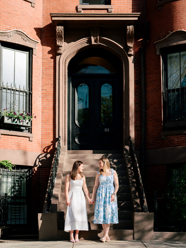 Spring engagement photos at South End Boston park with blooming tulips and daffodils