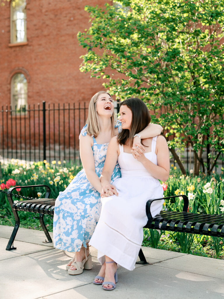 Romantic engagement portrait beneath cherry blossom tree Boston Public Garden