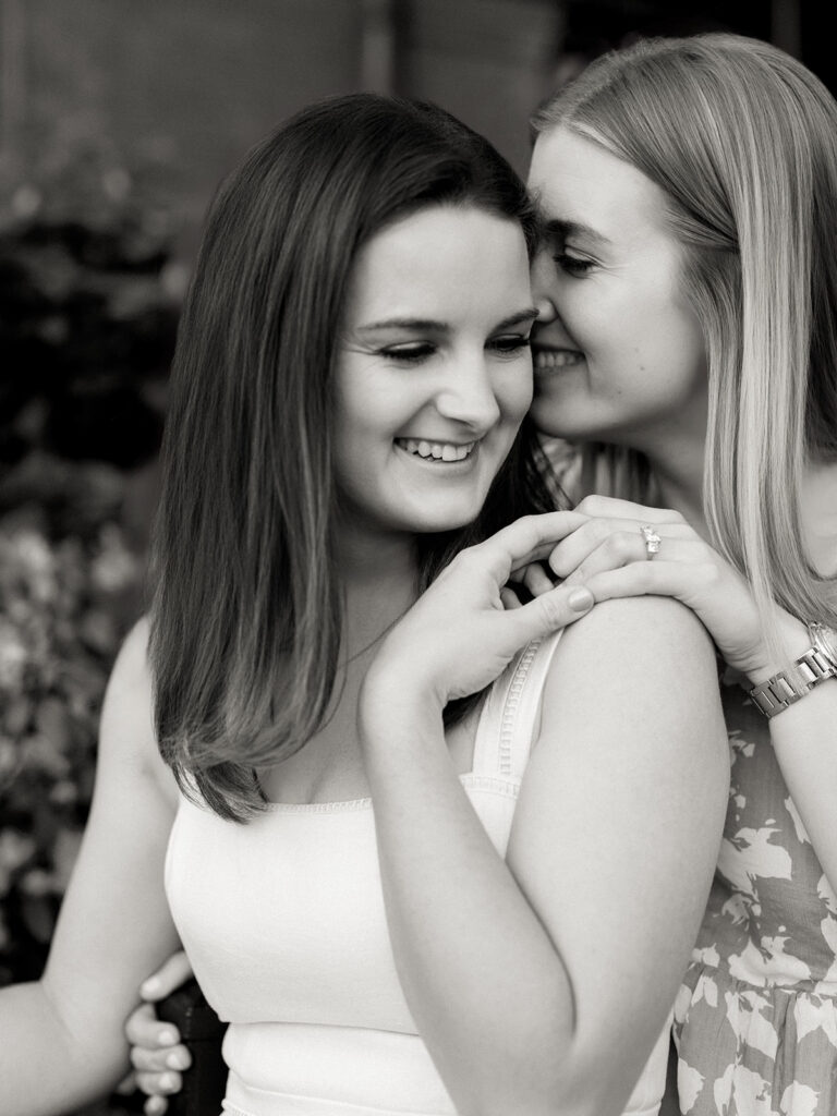 LGBTQ engagement photography in Boston featuring two brides during tulip season