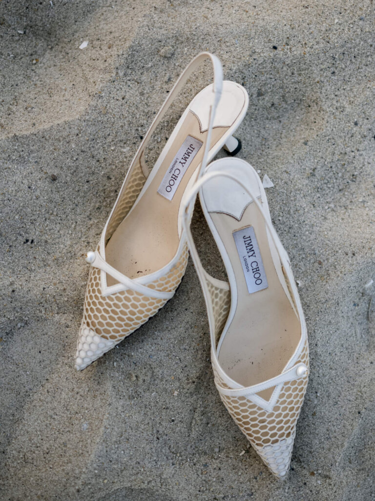 Bride and groom portrait with the ocean at Chatham Bars Inn on Cape Cod