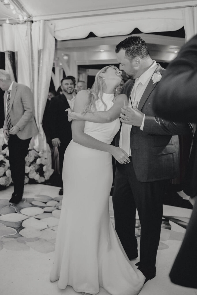 Dinner service inside the reception tent at Chatham Bars Inn