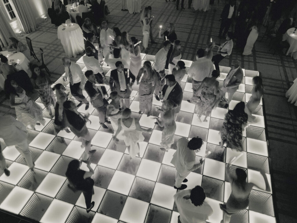 Bride and groom dancing with friends at Chatham Bars Inn on Cape Cod