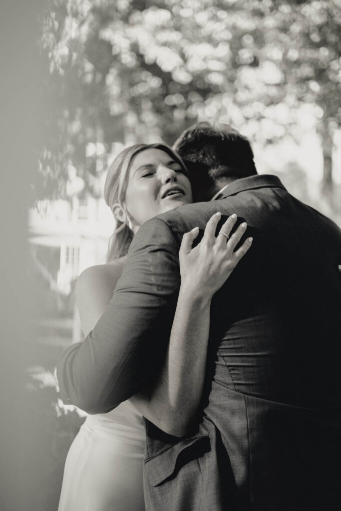 Emotional hug before the ceremony at St. Christopher’s Episcopal Church in Chatham