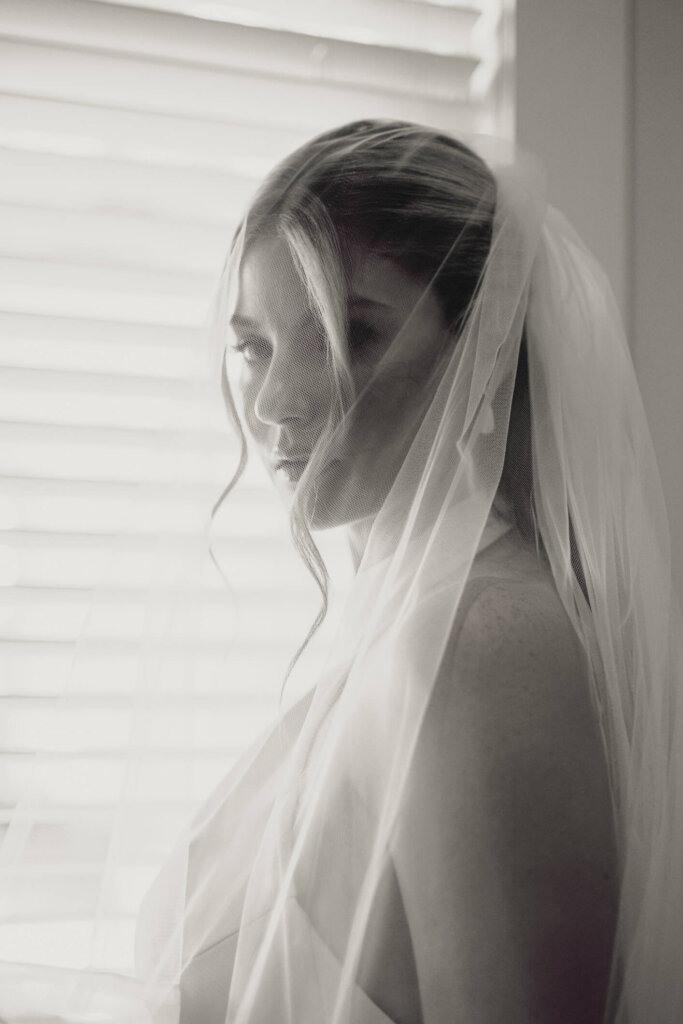 Veiled bridal portrait before the ceremony at St. Christopher’s Episcopal Church in Chatham
