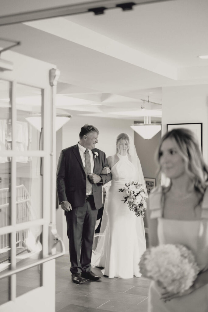 Bride waiting with her father before walking into St. Christopher’s Episcopal Church