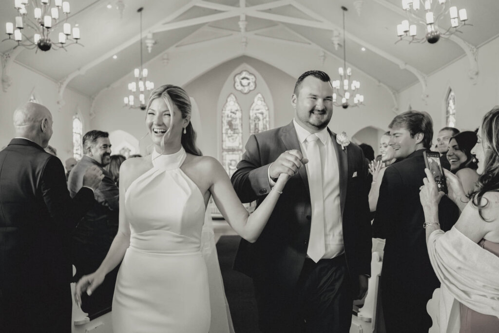 Guests celebrating the couple outside St. Christopher’s Episcopal Church in Chatham