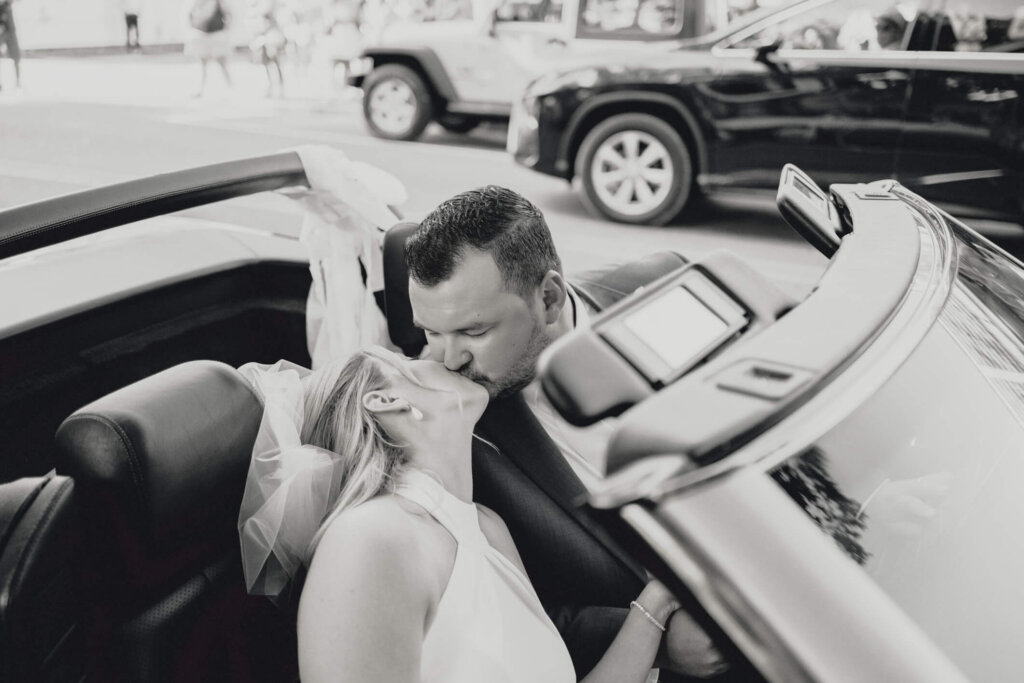 Bride and groom outside the church with wedding guests in Chatham, Massachusetts