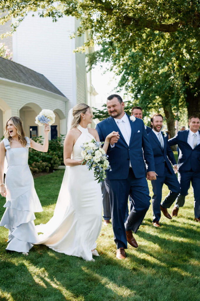 Wedding party celebrating outside St. Christopher’s Episcopal Church in Chatham