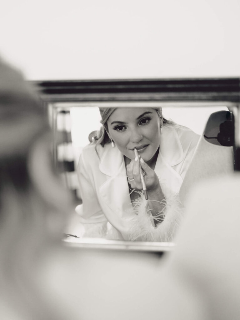 Mirror portrait of the bride getting ready at Chatham Bars Inn on Cape Cod