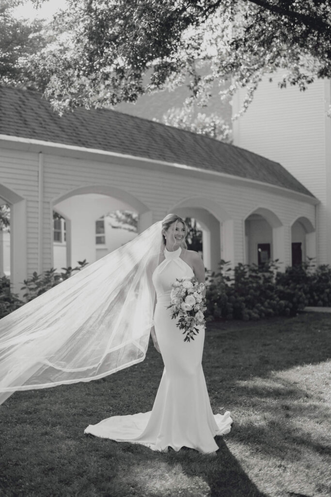 Bride and groom portrait outside Chatham Bars Inn in Chatham, Massachusetts