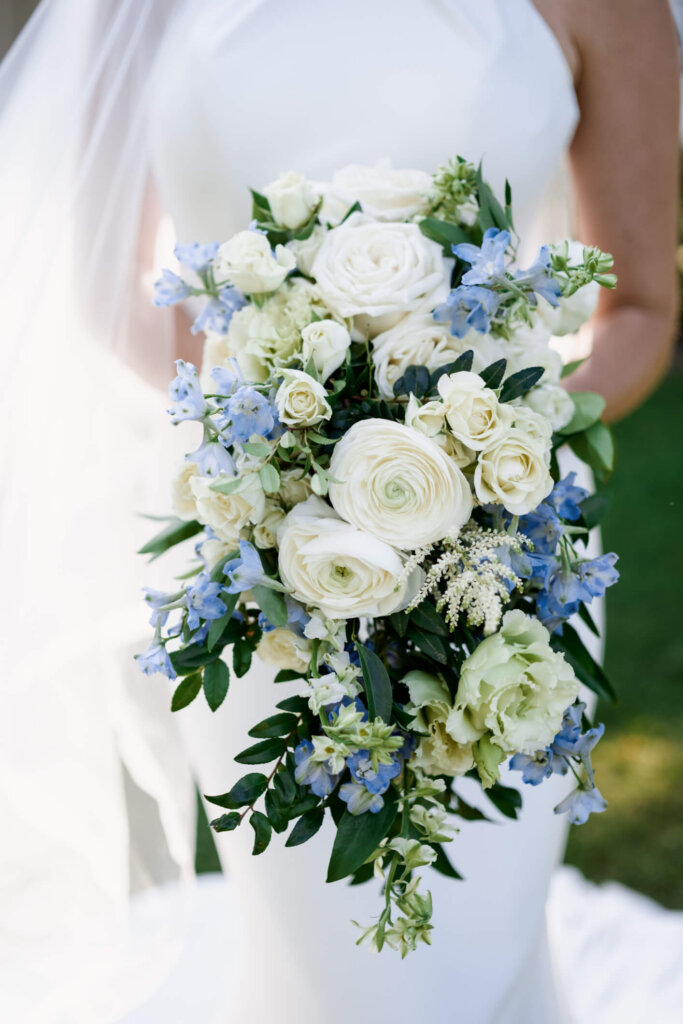 Close portrait of the bride and groom outside Chatham Bars Inn on Cape Cod