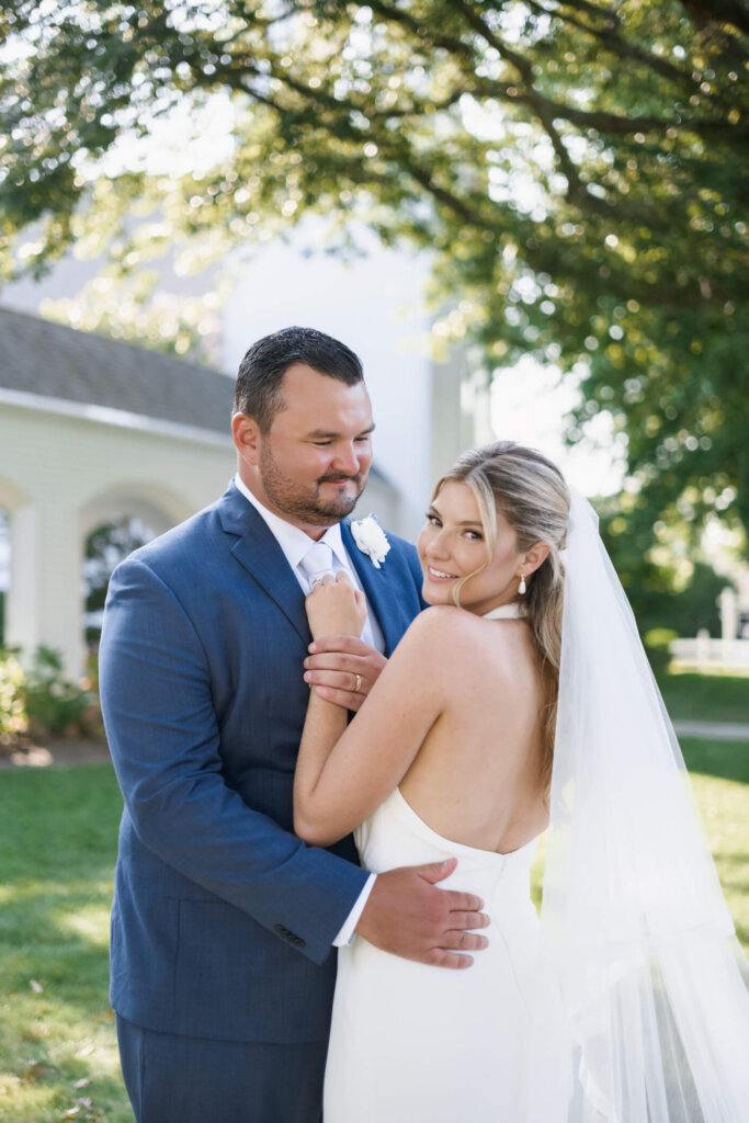 Bride’s bouquet and gown detail at a Chatham Bars Inn wedding on Cape Cod