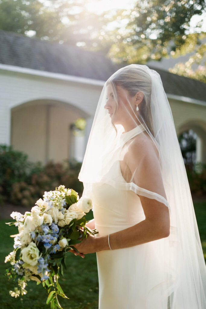 Bride portrait in her veil outside Chatham Bars Inn on Cape Cod
