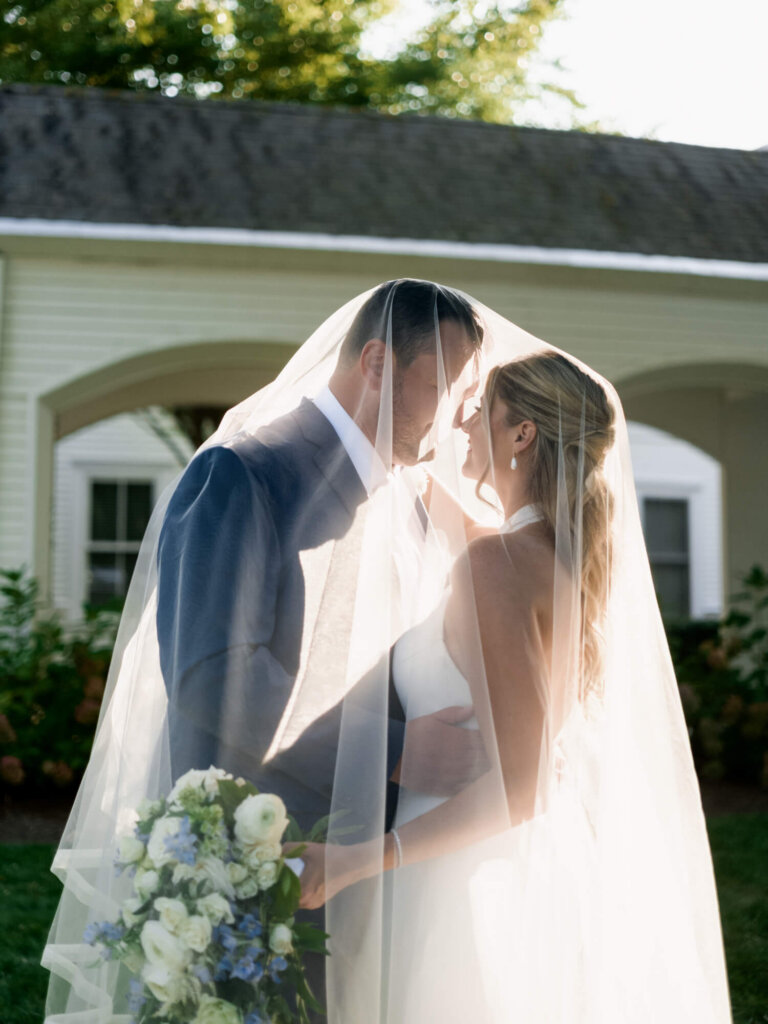 Wedding car pulling up to Chatham Bars Inn after the church ceremony