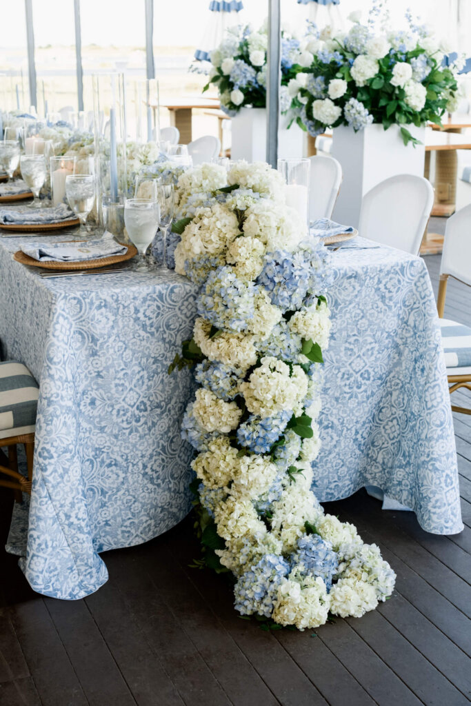 Blue and white floral runner on a reception table at Chatham Bars Inn