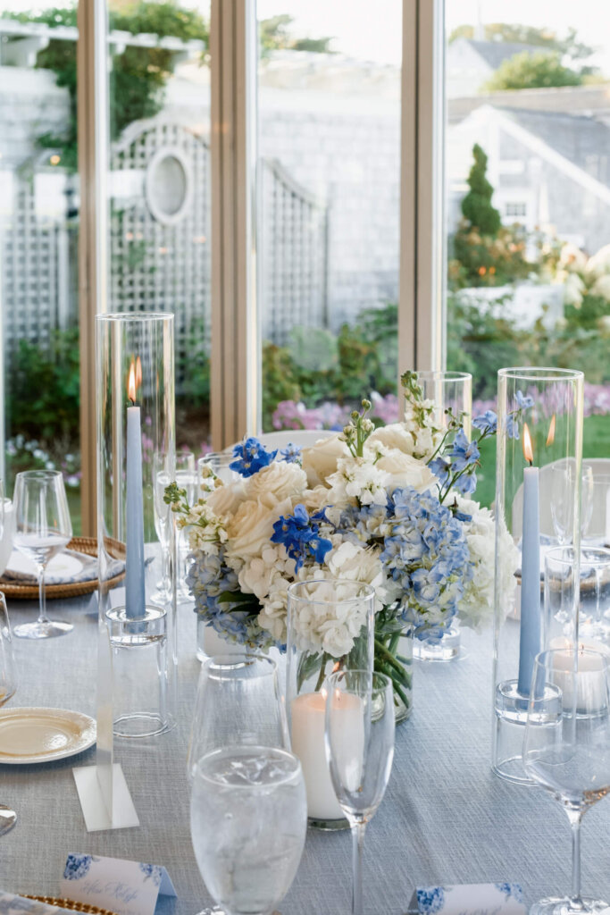Reception centerpiece with blue and white flowers at Chatham Bars Inn