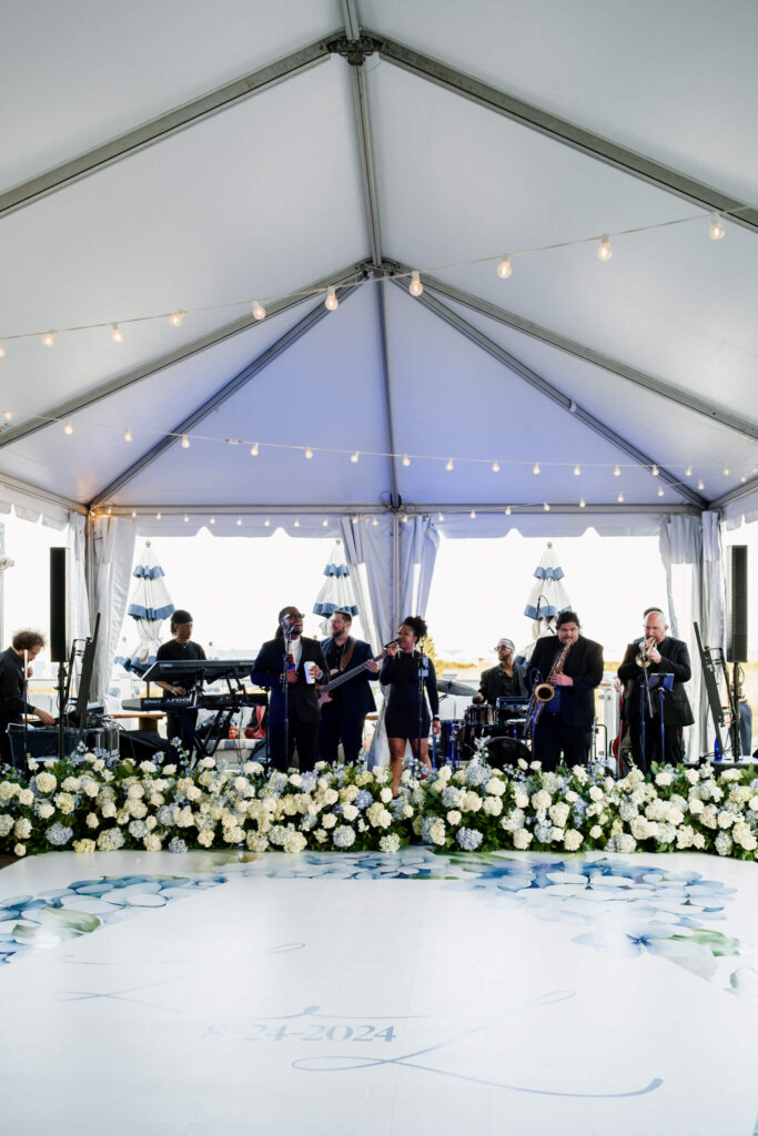 Live band performing inside the reception tent at Chatham Bars Inn