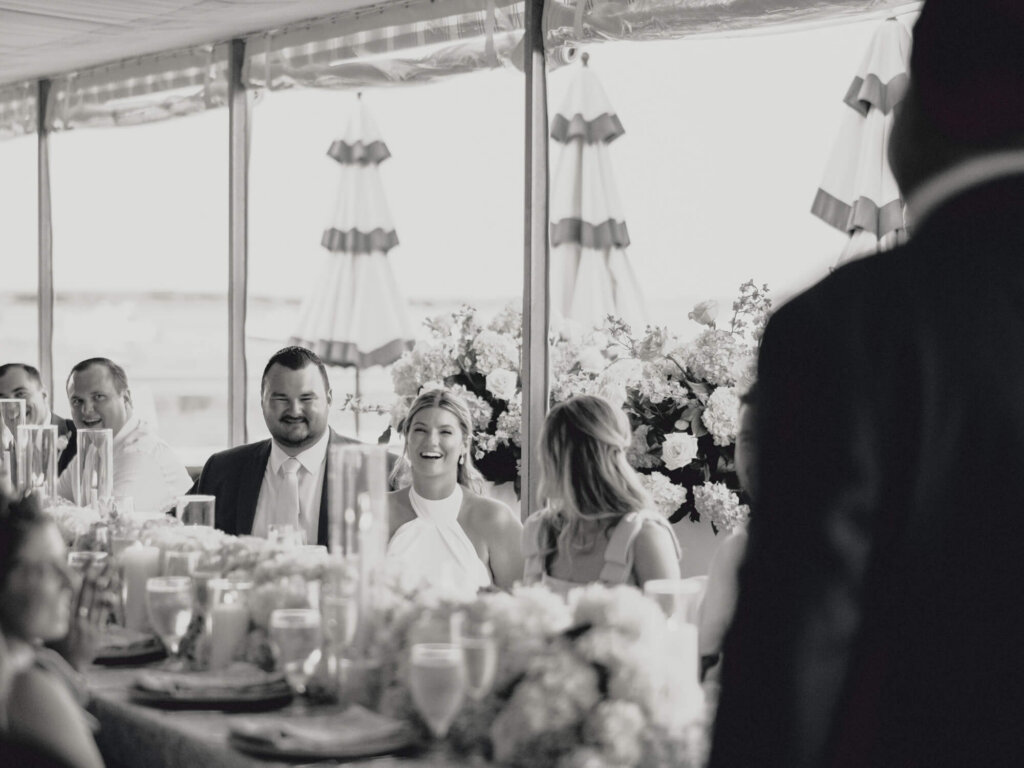 Guests watching speeches during the Chatham Bars Inn wedding reception