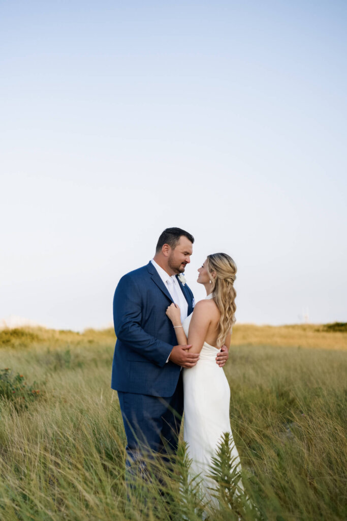 Bride and groom sunset portrait in the Cape Cod dunes at Chatham Bars Inn