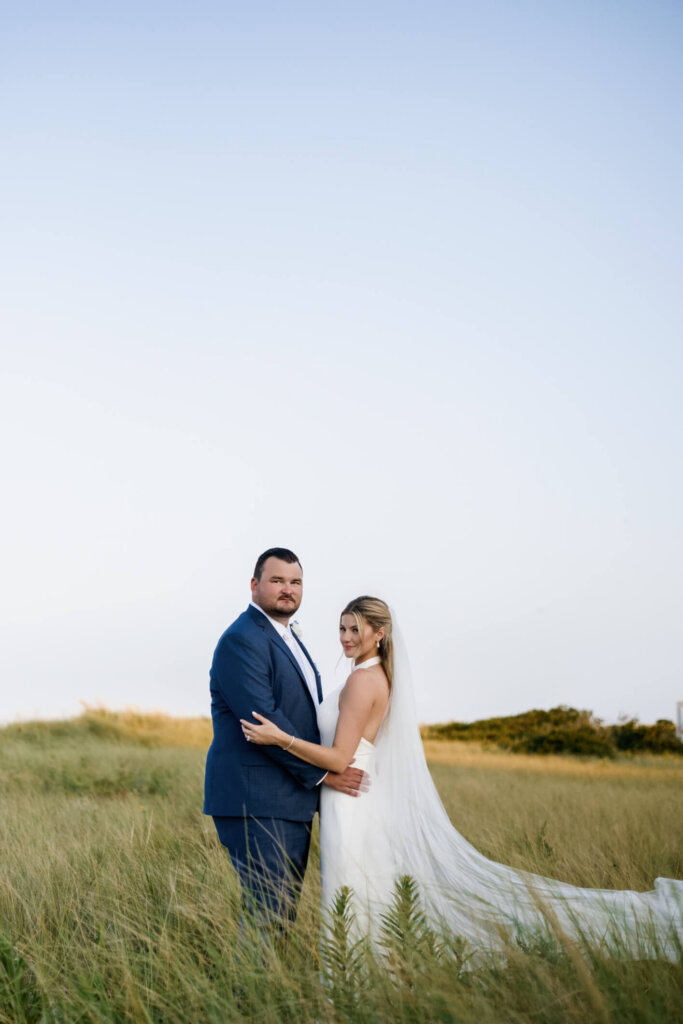 Bride and groom portrait in the golden hour dunes at Chatham Bars Inn