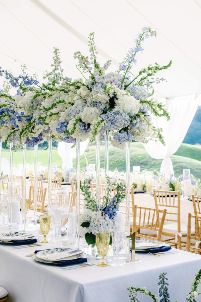 Blue floral table setting at Bedford Golf and Tennis Club wedding reception