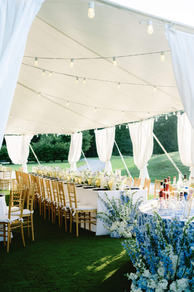 Bride and groom portrait inside the reception tent at Bedford Golf and Tennis Club