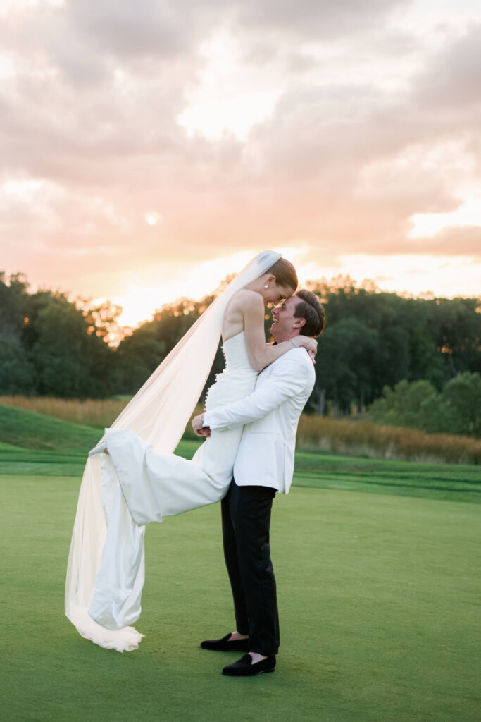 Bride reacting to a speech during the Bedford Golf and Tennis Club reception