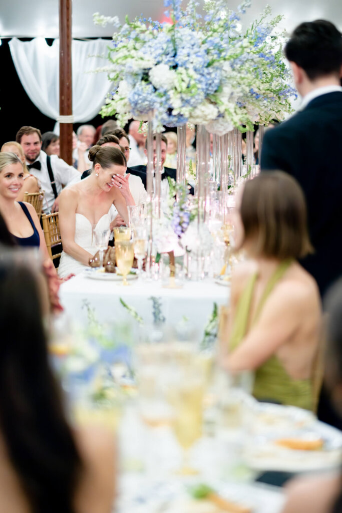 Guests dancing under the tent at the Bedford Golf and Tennis Club wedding reception