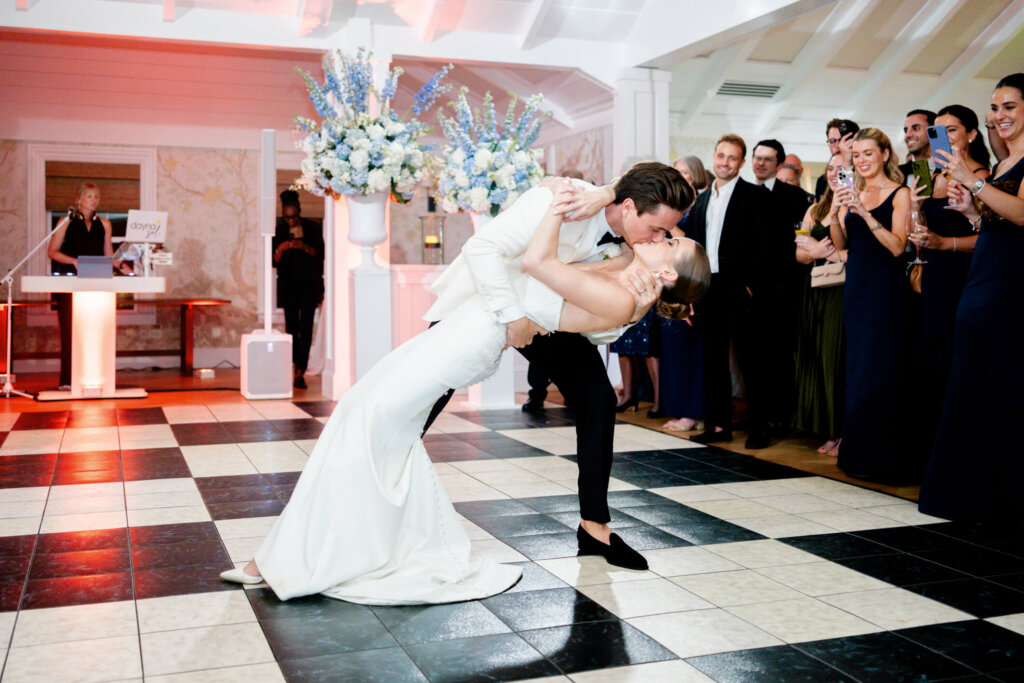 Bride in a short dress dancing at the Bedford Golf and Tennis Club reception