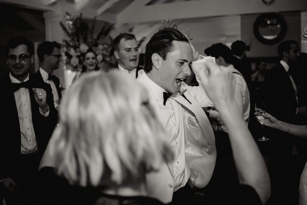 Reception party portrait under the tent at Bedford Golf and Tennis Club