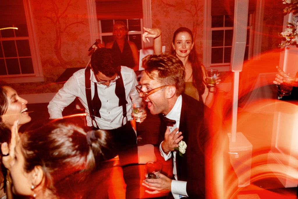 Bride and groom celebrating during the after party at Bedford Golf and Tennis Club
