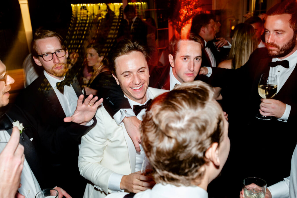 Bride dancing with friends during the Bedford Golf and Tennis Club after party
