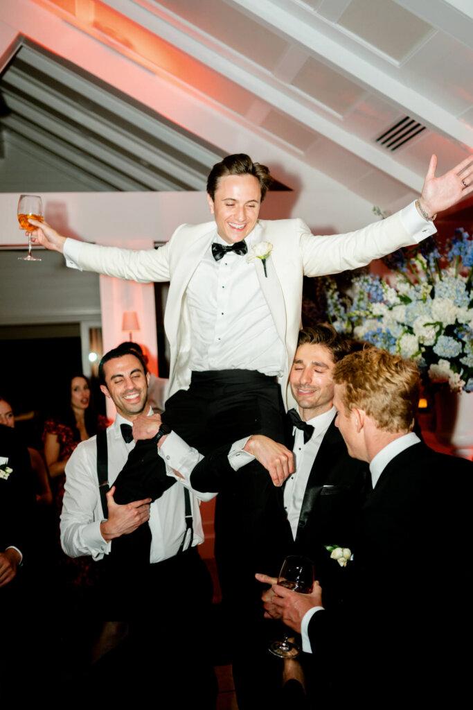 Groom dancing during the after party at Bedford Golf and Tennis Club