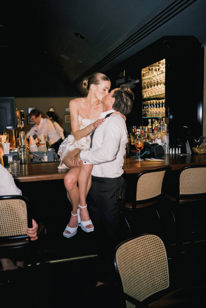 Bride and groom celebrating on the dance floor at Bedford Golf and Tennis Club late in the night