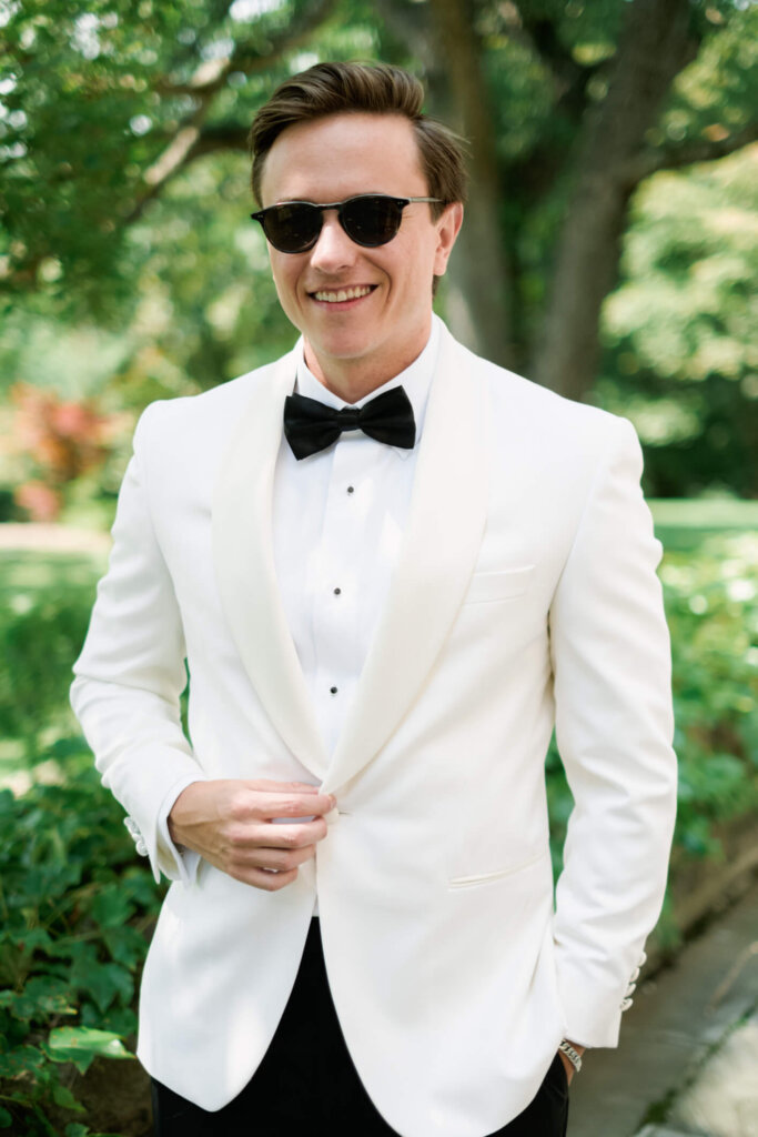 Groom portrait indoors before the Bedford Golf and Tennis Club wedding