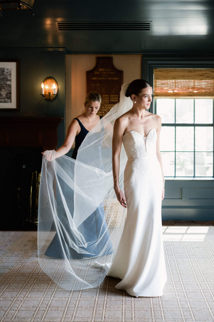 Bride portrait by the windows at Bedford Golf and Tennis Club