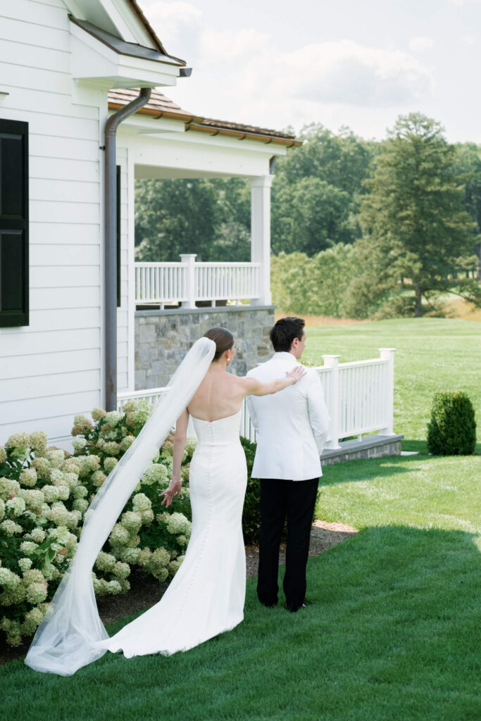 Bride and groom portrait after their first look at Bedford Golf and Tennis Club