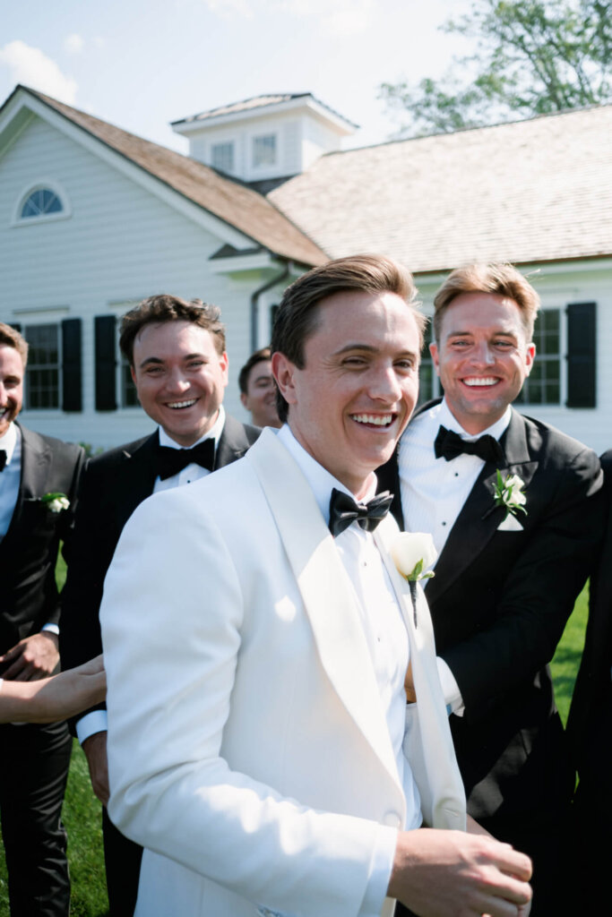 Bride and bridesmaids portrait with blue and white bouquets in Bedford, New York