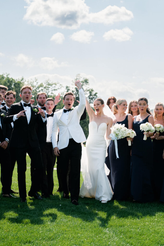 Bride and groom seated portrait before the Bedford Golf and Tennis Club ceremony